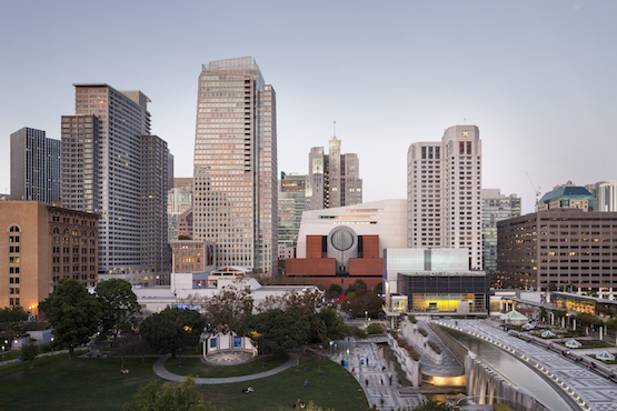 The new SFMOMA Snøhetta-designed building (2016) is visible behind the original red-brick Mario Botta-designed structure (1995).
